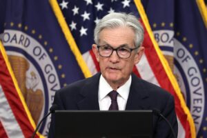 Fed Holds Interest Rates Steady, But Signals Cuts May Happen This Year