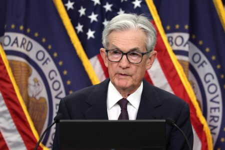 Fed Holds Interest Rates Steady, But Signals Cuts May Happen This Year